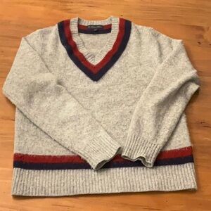 Gray V-Neck Sweater with Red and Blue Accents
